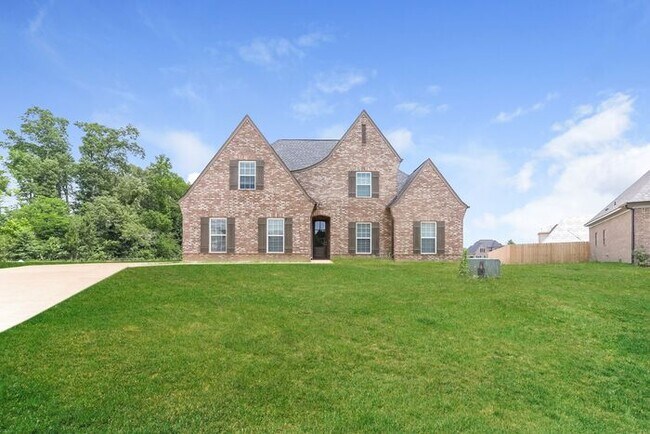 Building Photo - Now Leasing a 4 bedroom 3 bath home in Olive Branch