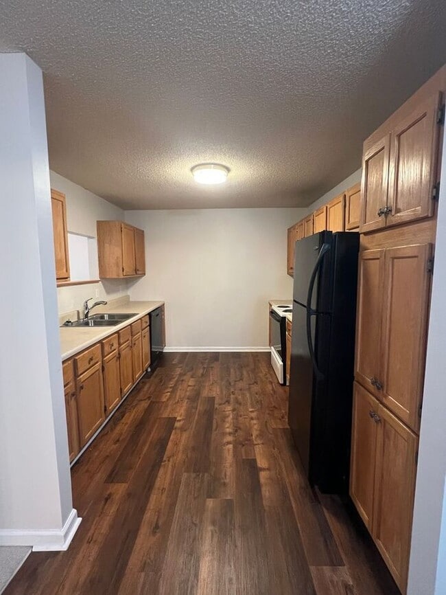 Building Photo - Ready now! Enjoy a private serene setting in the heart of the city!