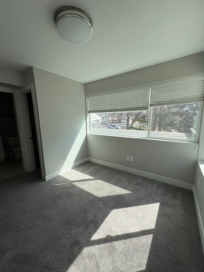 Building Photo - Modern 2 Bed + Flex Townhome with Rooftop Deck Near Paco Sanchez Park & Light Rail