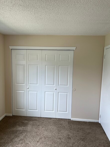 Bifold fully opening closet door - 8308 Tamarron Dr