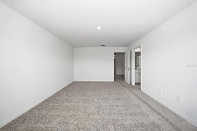 Building Photo - 8879 Coqui Song Ln