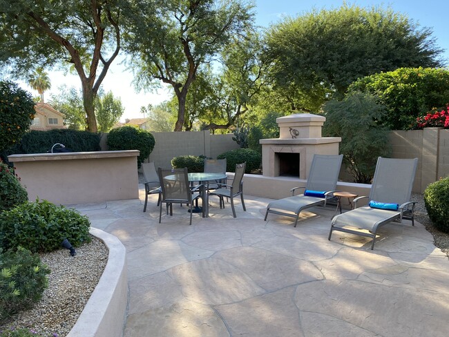 Large Flagstone Patio with plenty of seating. - 9257 E Sutton Dr