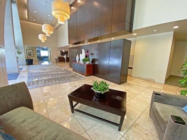 Building Photo - Live at The Axis High-Rise! Upscale, Urban...