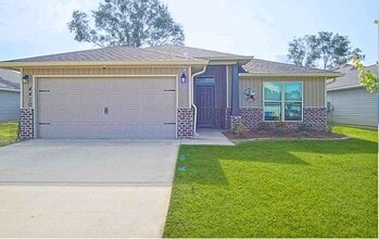 Building Photo - Popular Floor Plan, Almost New Home in Woo...