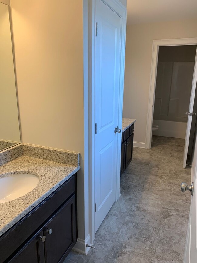 Building Photo - HOME IN PARC @ THE AU CLUB