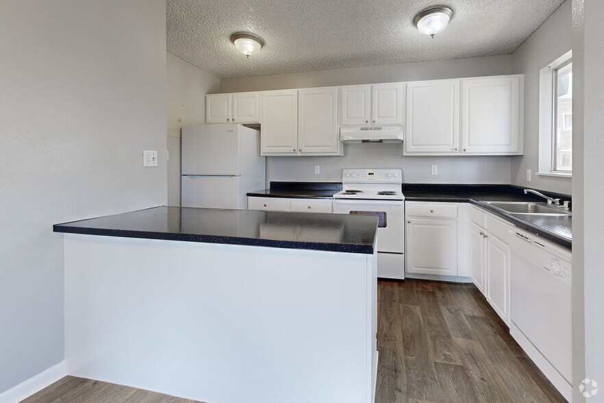 2BR, 1BA - 950SF - Kitchen - The Flats at Sky Village