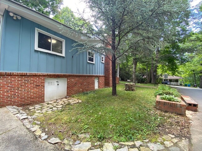 Building Photo - Black Mountain - Wooded lot, One-Level home, Room to Garden!