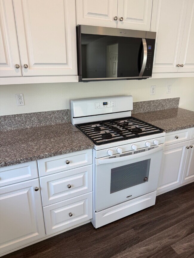 Building Photo - This beautiful home is on corner lot and with energy efficient features including solar.  New flo...