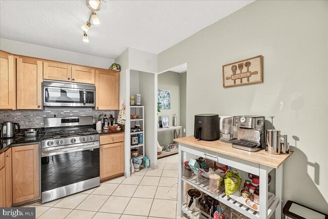 Building Photo - 5225 Pooks Hill Rd