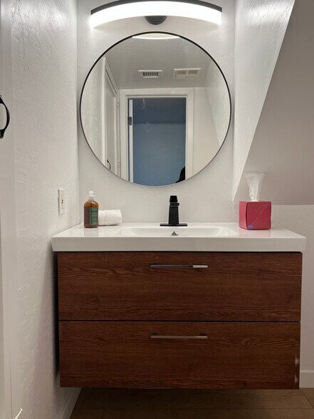 downstairs half bath - 8150 N Central Ave