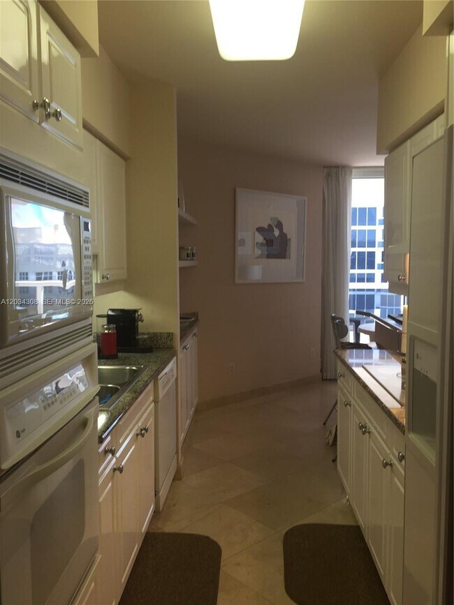 Building Photo - 4779 Collins Ave