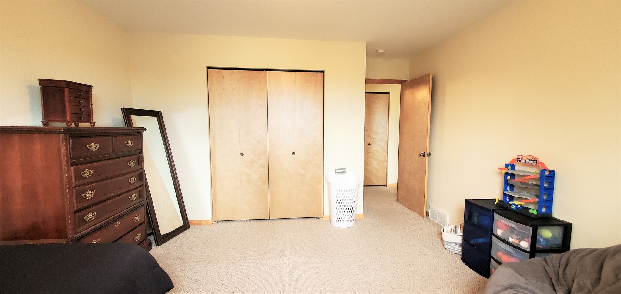 Bedroom 2/upper level. (photo from neighboring unit with the same layout) - 1756 St Joseph St