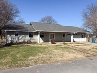 Building Photo - 2-Bedroom Handicap-Accessible Home with 3-Season Porch, Garage, and Large Yard