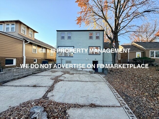 Building Photo - 3208 W 42nd Ave