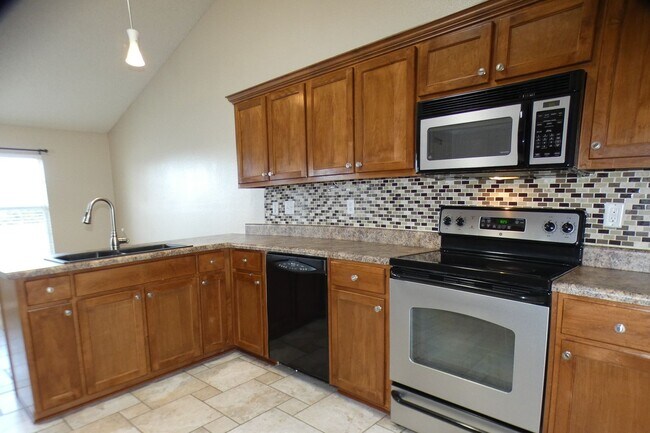 Building Photo - Spacious 4-Bedroom All Brick Home