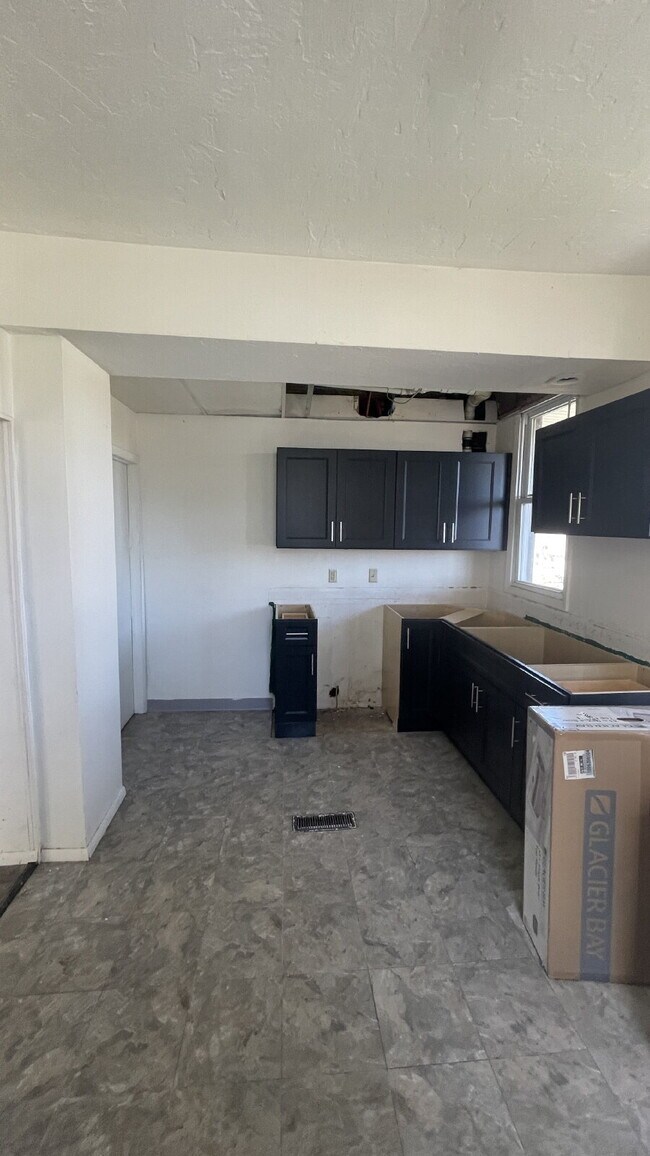 Building Photo - Discover Potential: Prime Location for Your Next Venture at 410-412 Parker Avenue, Scottdale!