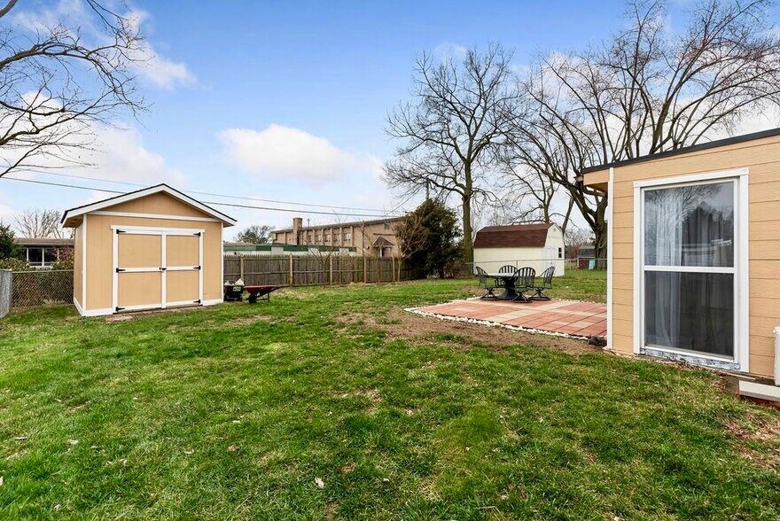 Fully fenced back yard with storage shed! - 11 Lawndale Ave