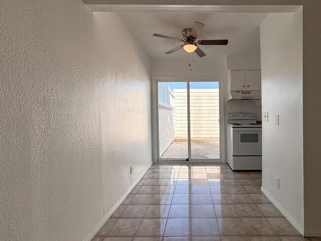 Building Photo - Desirable End-Unit Townhome with 2-Car Garage & Private Courtyard