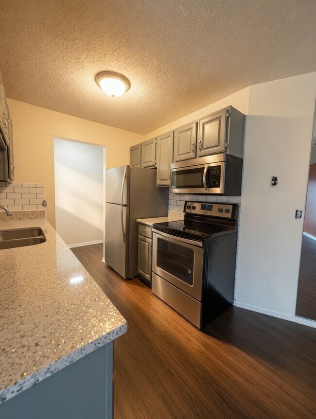 Building Photo - Freshly Updated, Stylish 2 bed 2 bath Condo in Bloomington Includes 2 Heated Parking Spaces!