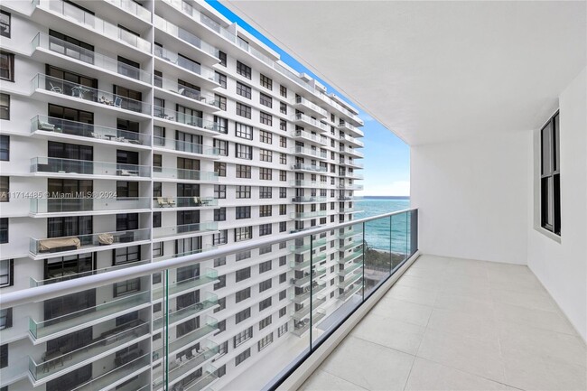 Building Photo - 9801 Collins Ave