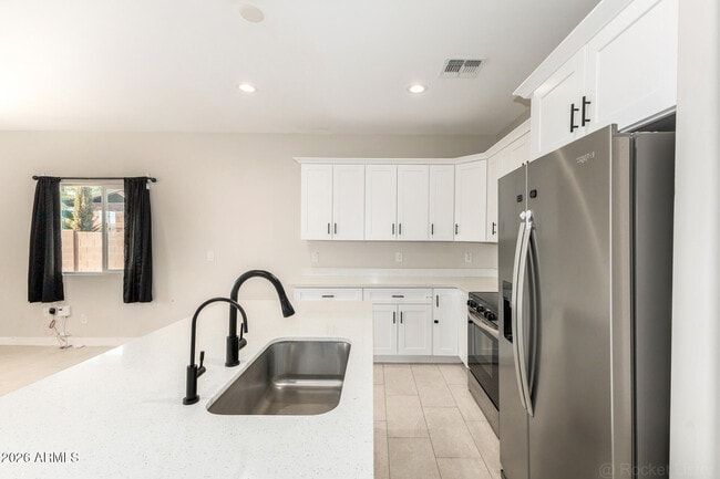 Building Photo - 10019 W Monaco Blvd