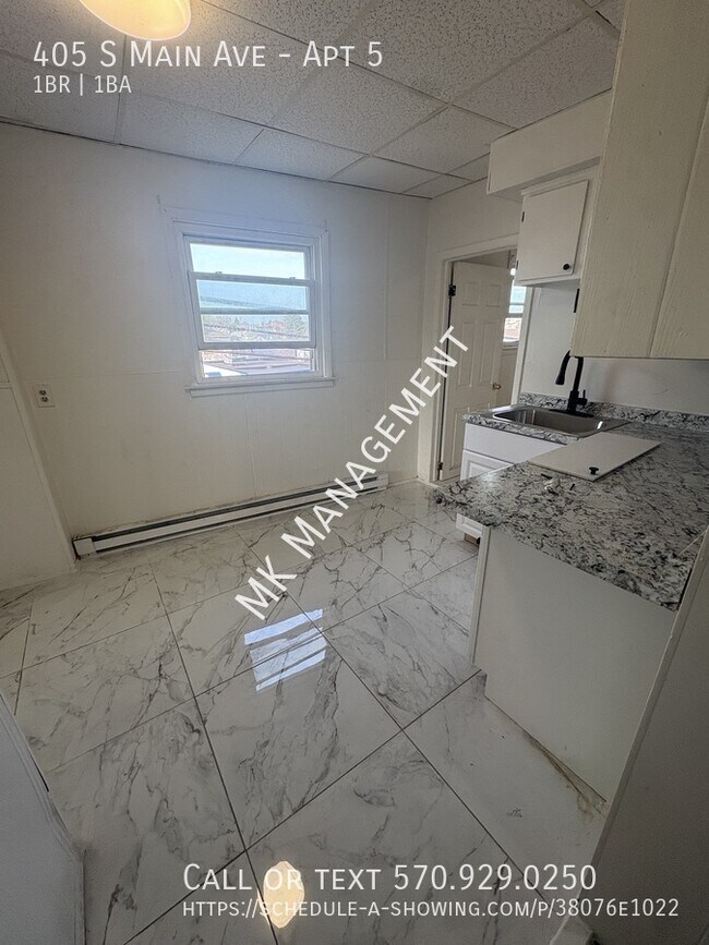 Building Photo - 405 S Main Ave