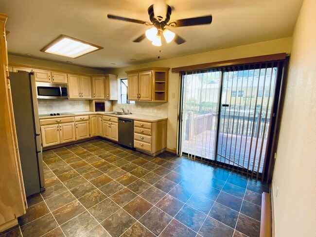 Building Photo - {5639} Spacious Ranch + Two Separate Living Quarters + Fenced Yard!