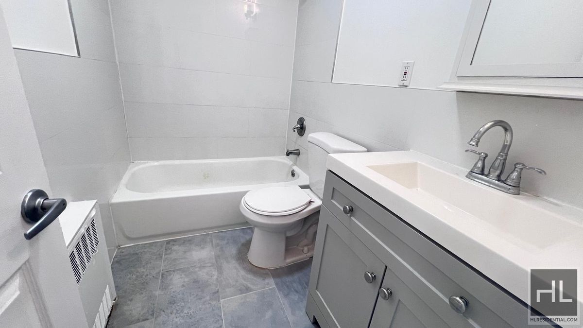 Building Photo - GUT RENOVATED VERY LARGE 3 BEDEROOMS W/ PR...