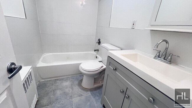 Building Photo - GUT RENOVATED VERY LARGE 3 BEDEROOMS W/ PR...