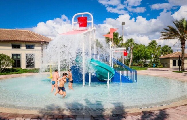 Building Photo - BEAUTIFUL CHAMPIONS GATE 2 BED 2 BATH COND0  w/GARAGE - FULLY FURNISHED - 12 MONTH RENTAL