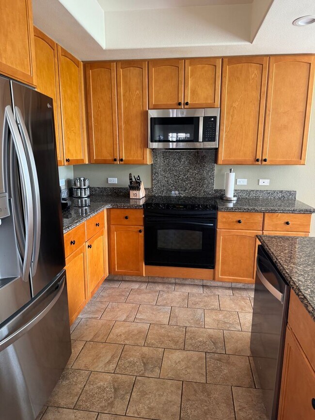 Building Photo - Luxurious Fully Furnished Long-Term Townhome Rental