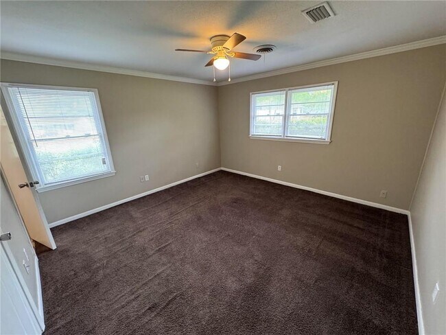 Building Photo - 5855 Woodvale Dr