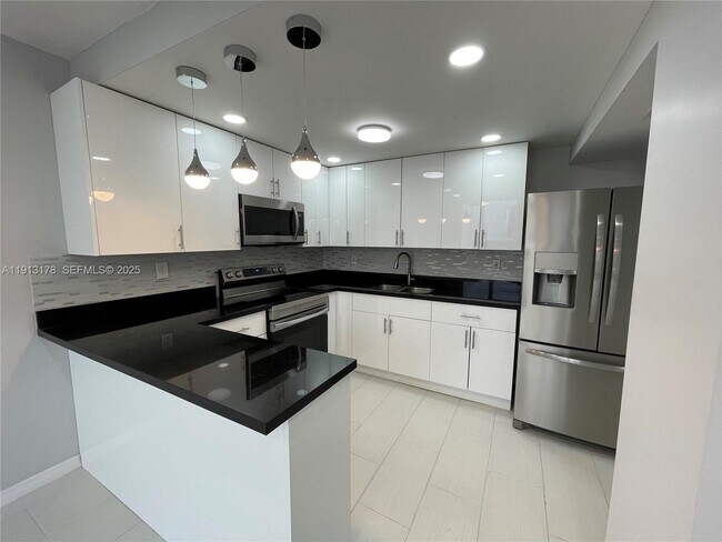 Building Photo - 3865 W 9th Ave