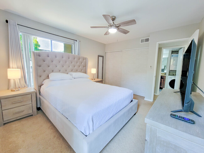The bedroom includes a large closet, 2 large windows and a Smart TV with HDMI. - 3500 N Hayden Rd