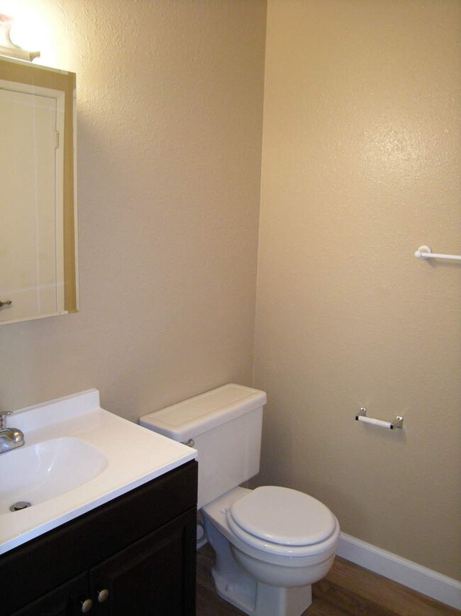 Building Photo - Condo unit featuring updated kitchen with ...