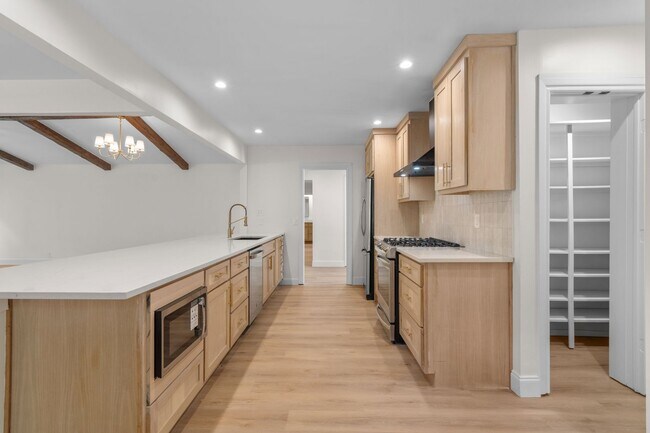 Building Photo - Totally renovated open concept with vaulted ceilings