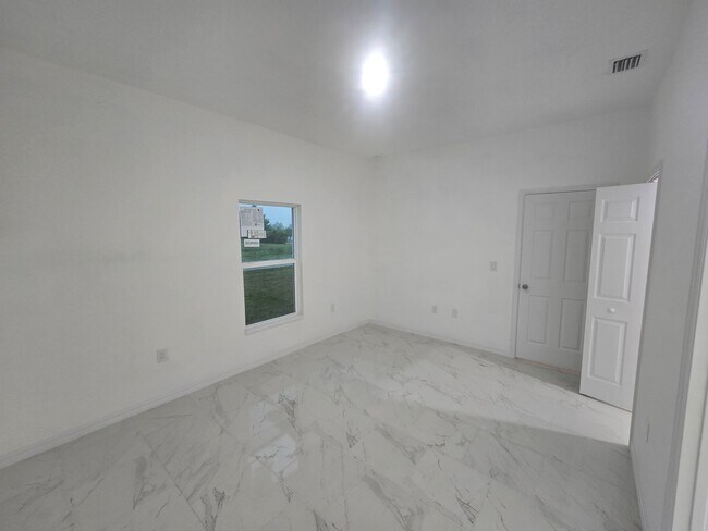 Building Photo - BRAND NEW THREE BEDROOM, 2 BATH, 1 CAR GAR...