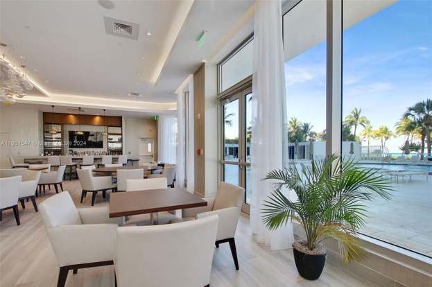 Building Photo - 10155 Collins Ave