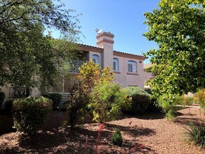 Building Photo - Cozy Condo with fireplace in living room.