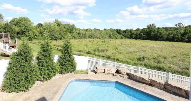 Building Photo - 4 Bedroom, 4 Bath Home w/Backyard Heated Pool overlooking Pearl's Fen