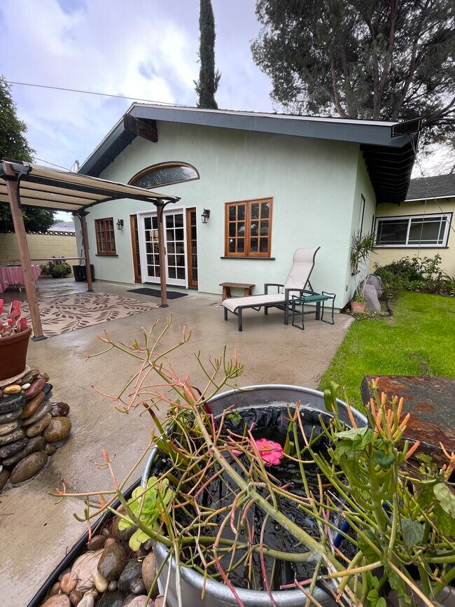 Back Pergola and House in Rain - 23437 Vanowen St
