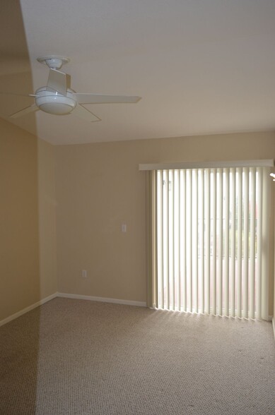 master bedroom with private porch. recently painted white. - 1648 S Cole St