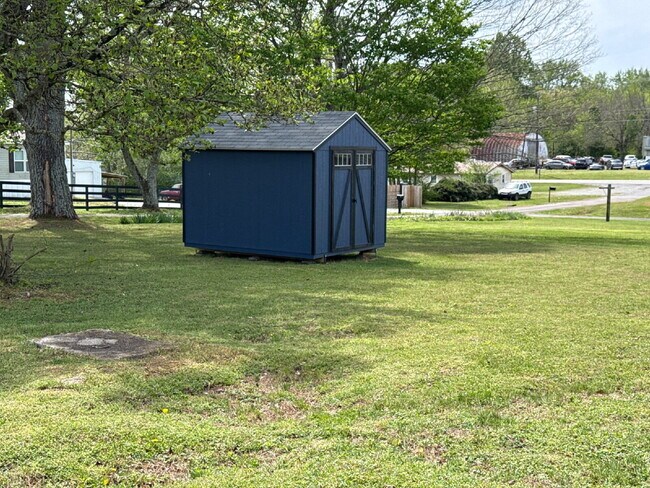 Building Photo - "Charming 4-Bedroom Home with Hardwood Floors on Ready Section Road!"