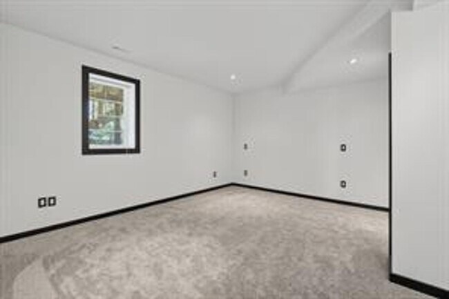 Building Photo - Spacious 5-Bed Walkout Home with Over 3,50...