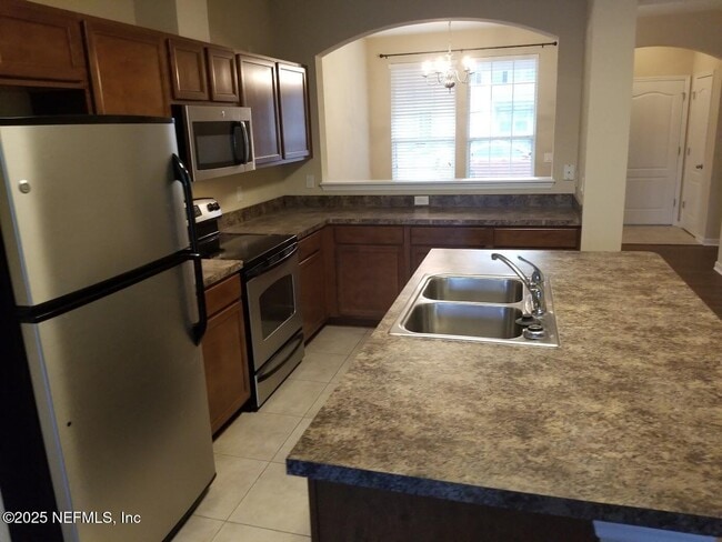 Building Photo - 4220 Plantation Oaks Blvd