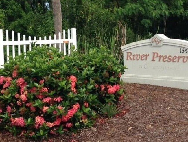 Building Photo - Annual 2/2 Condo with Flex Room in River Preserve Featuring Community Pool