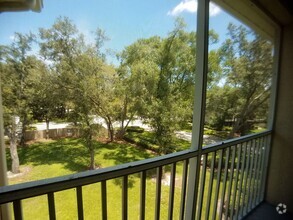 Building Photo - Beautiful 2/2 Relaxing Courtyard Balcony V...