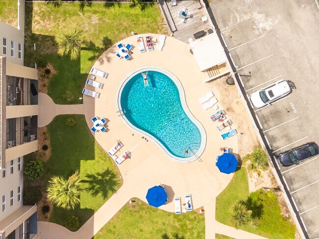 Building Photo - Wake Up to the Ocean Breeze – Your Beachsi...