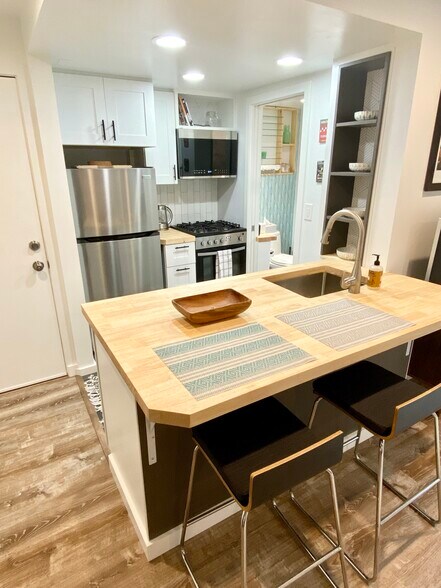 Kitchen with large island. - 4045 54th Ave SW
