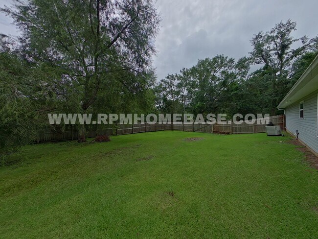 Building Photo - Your Baker Sanctuary with Spacious Backyar...